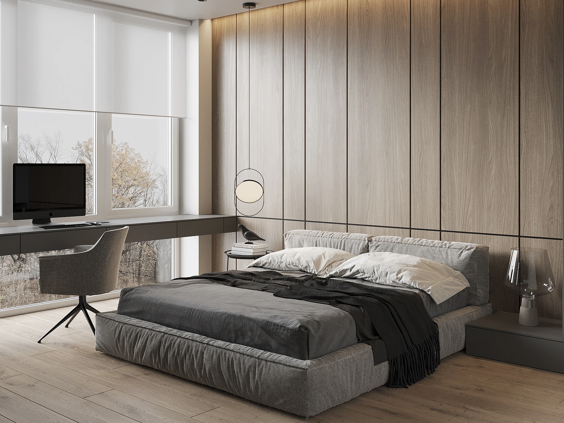 Phòng ngủ phong cách hiện đại với giường nỉ xám, vách đầu giường ốp gỗ và góc làm việc cạnh cửa sổ kính lớn.