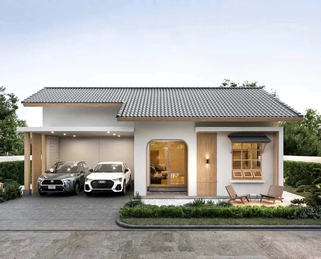 Phối cảnh nhà vườn 1 tầng mái Nhật hiện đại có gara hai ô tô, cửa kính vòm và sân vườn phía trước.